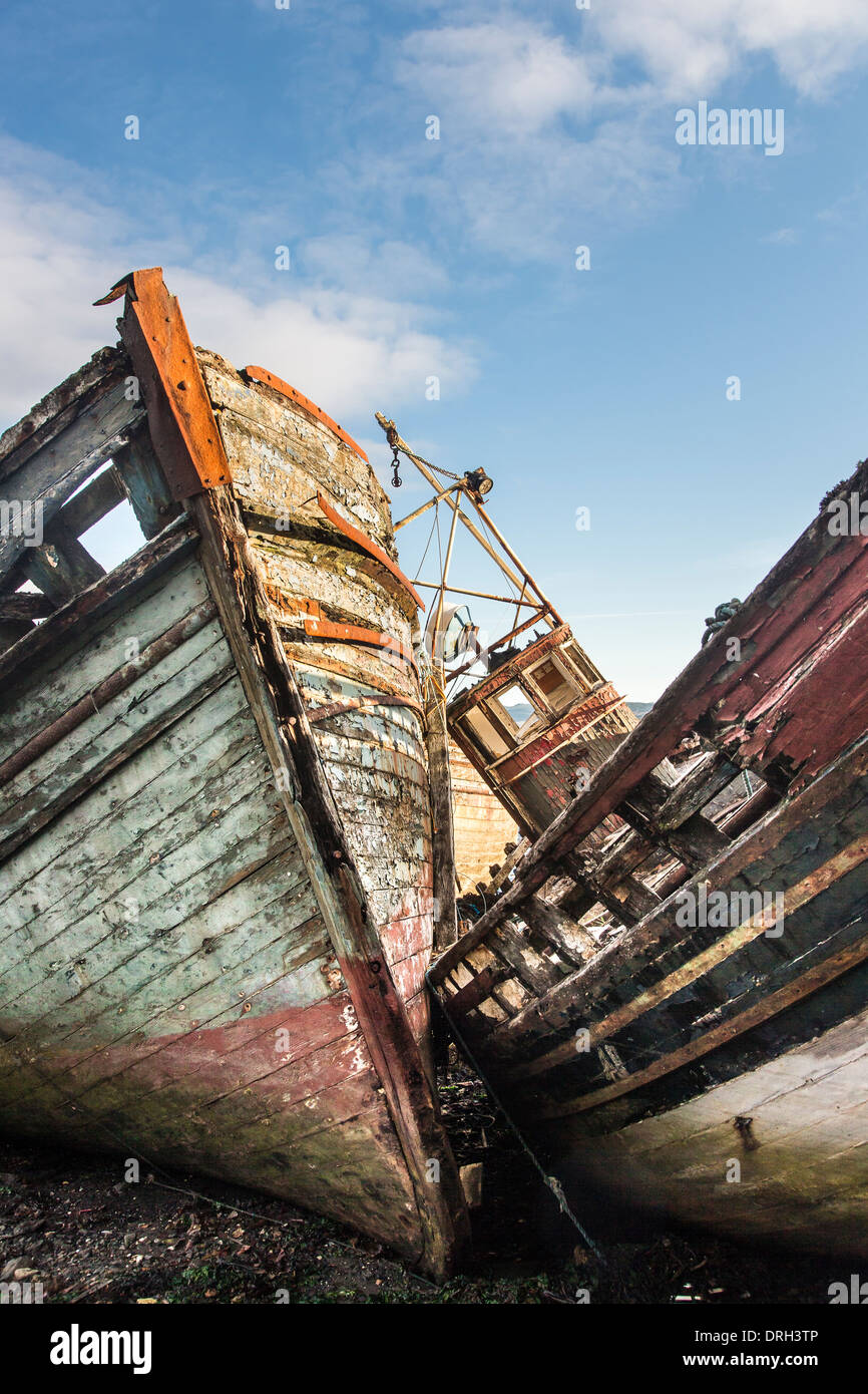 Beached Derelict Boats on the Isle of Mull in Scotland. Stock Photo