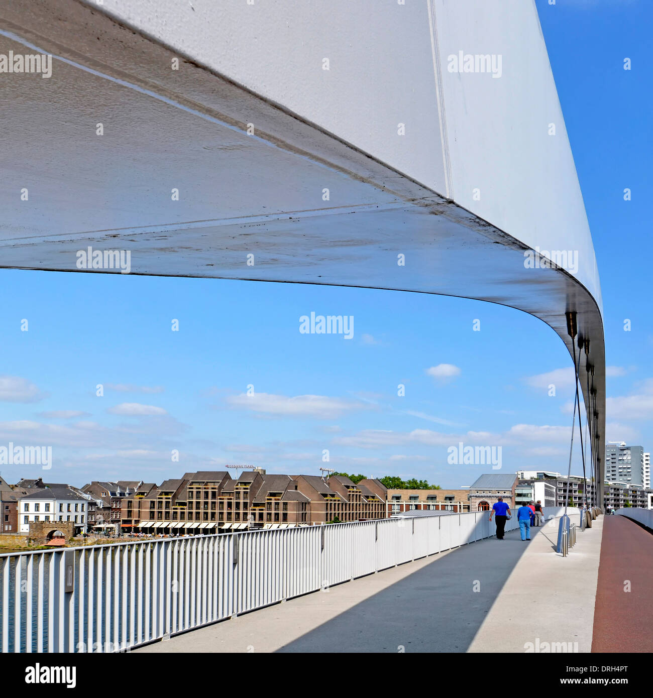 Maastricht Limburg clear span Hoge Brug (high bridge also Hoeg Brögk) pedestrians & cyclists only River Meuse In summer urban landscape Netherlands EU Stock Photo