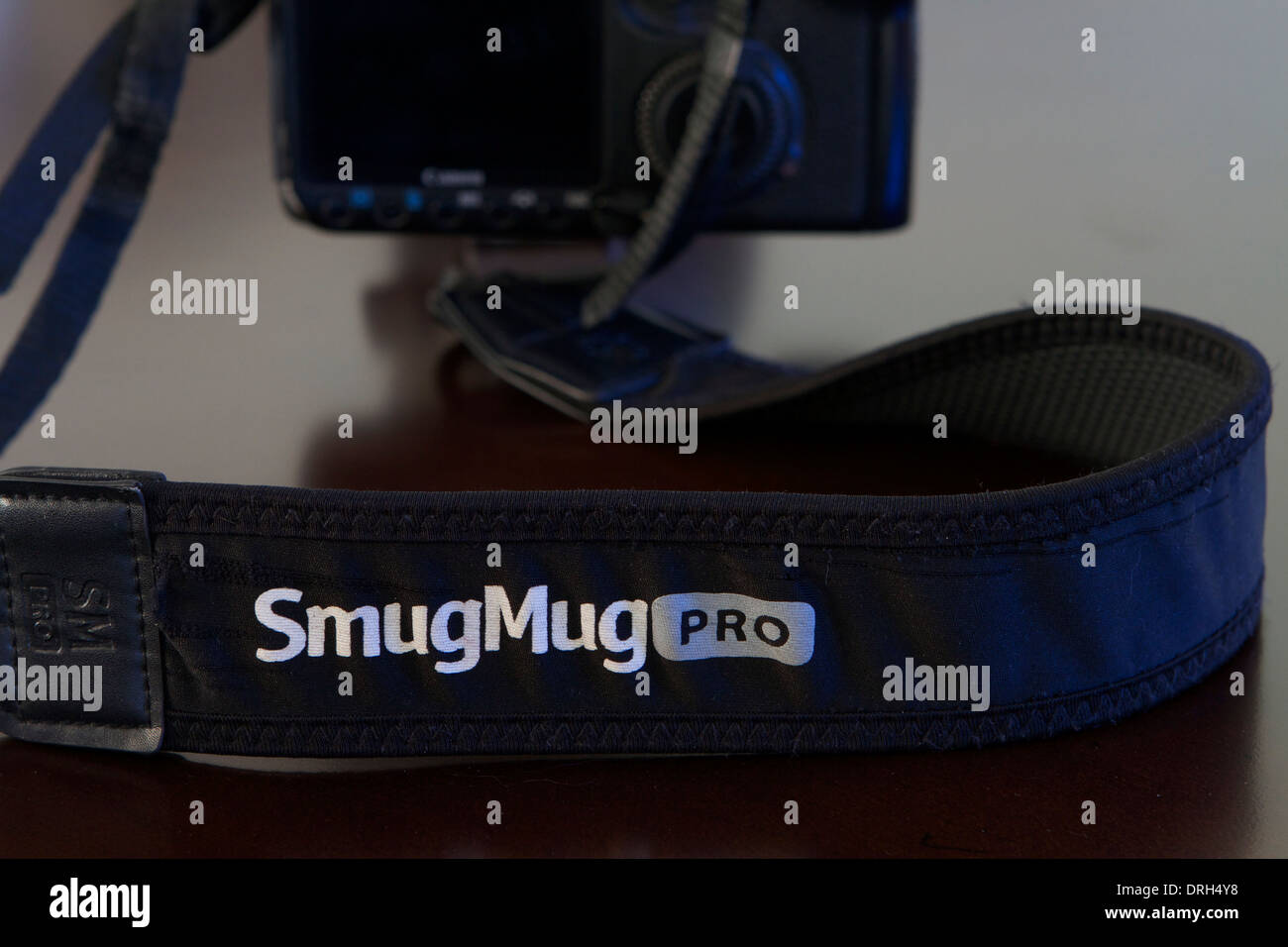 Smumug  photo sharing camera strap logo Stock Photo