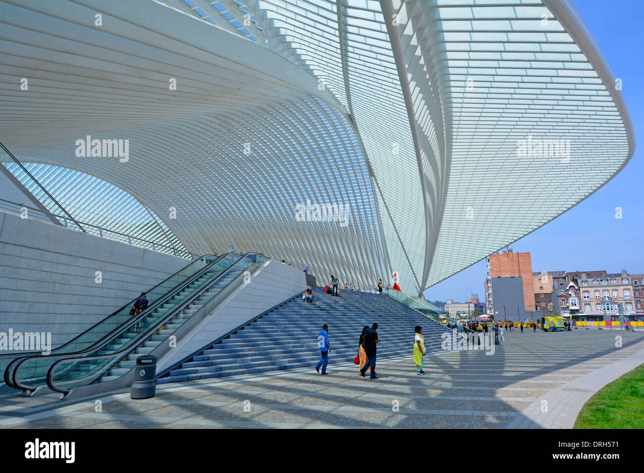 Exterior of futuristic shape modern glass ceiling & roof covering train station & entrance at Liege Belgium public transport infrastructure building Stock Photo