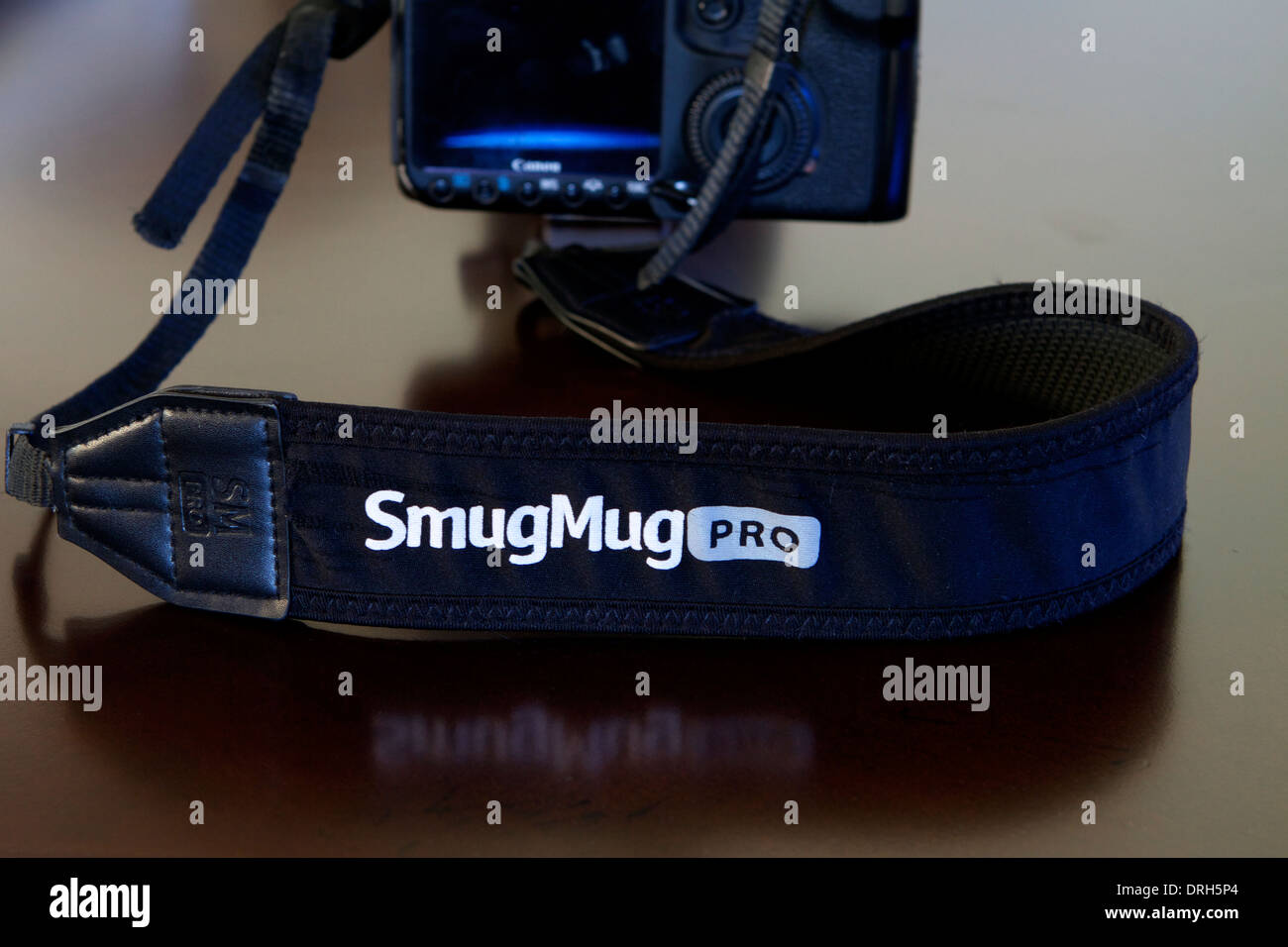 Smumug  photo sharing camera strap logo Stock Photo