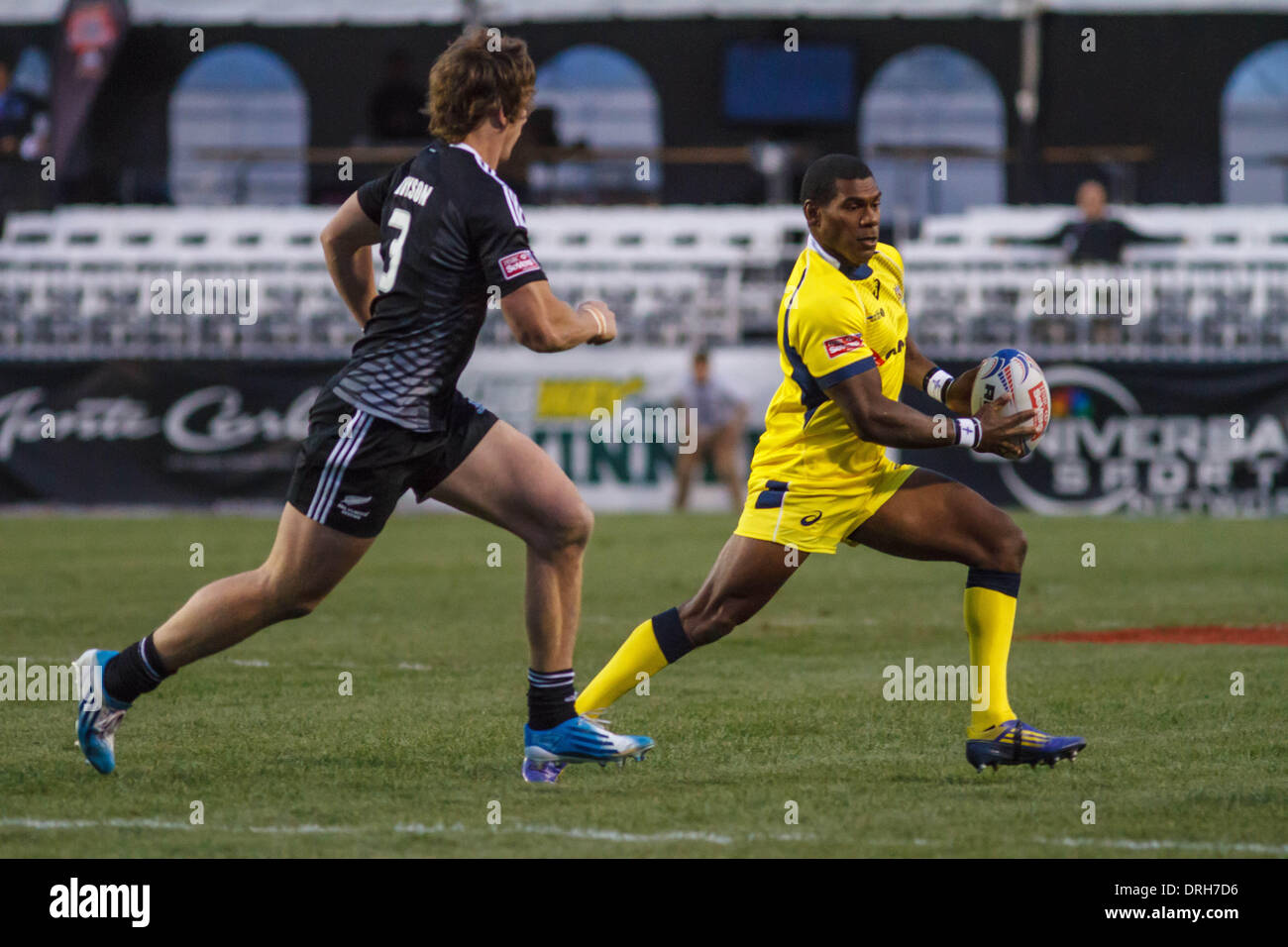 Las Vegas, NV, USA. 24th Jan, 2014. Boyd Field. Australia runs with the ball during day one at the USA Sevens Rugby HSBC Sevens World Series at Sam Boyd Stadium in Las Vegas, Nevada. © Action Plus Sports/Alamy Live News Stock Photo