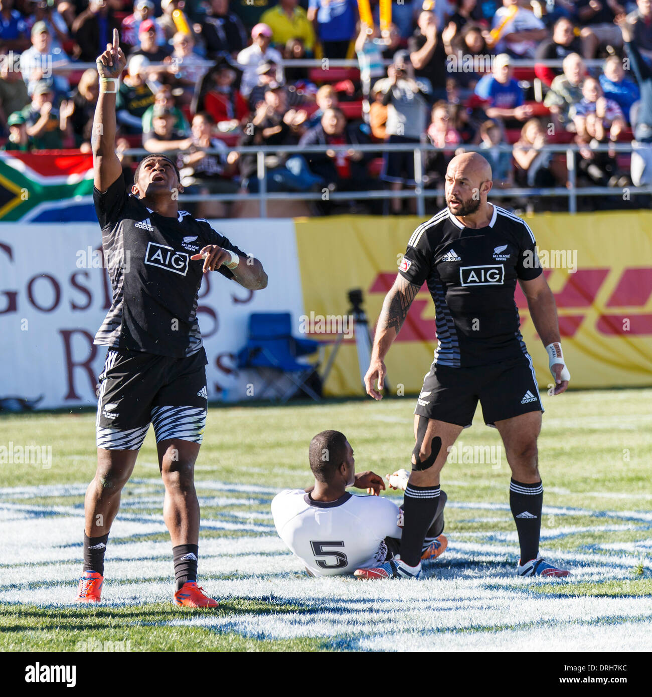 Las Vegas, Nevada, USA. 25th Jan, 2014. New Zealand vs Fiji in Pool B match. Waisake Naholo #9 of New Zealand celebrates after try score as D J Forbes #4 of New Zealand congratulates. Final score: New Zealand 12 -Fiji 7 at the USA round of the HSBC Sevens World Series in Sam Boyd Arena, Las Vegas, Nevada. Credit:  Action Plus Sports/Alamy Live News Stock Photo