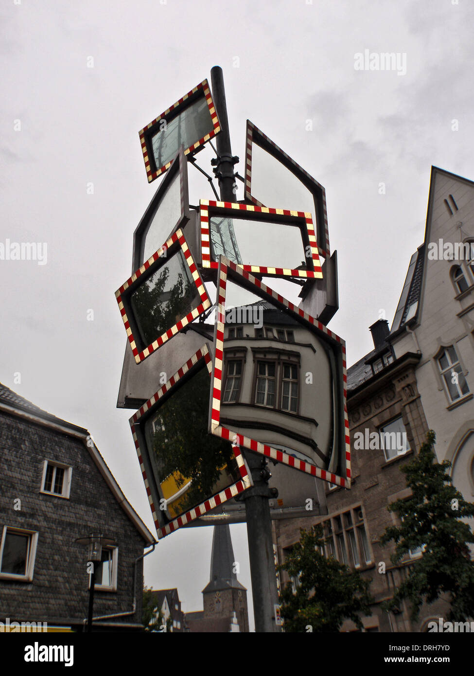 Lots of mirrors on a pole Stock Photo