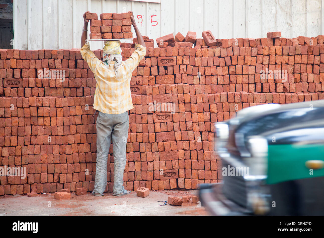 Man loading bricks hires stock photography and images Alamy