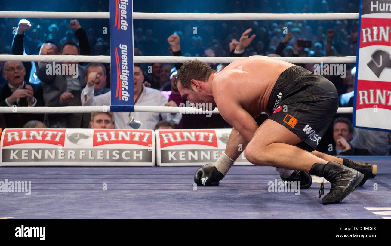 Stuttgart, Germany. 26th Jan, 2014. German boxer Firat Arslan in action during the World boxing Organization (WBO) Cruiserweight Championship match against Marco Huck at Schleyer Hall in Stuttgart, Germany, 26 January 2014. Firat Arslan lost by technical k.o. in the sixth round. Photo: SEBASTIAN KAHNERT/dpa/Alamy Live News Stock Photo