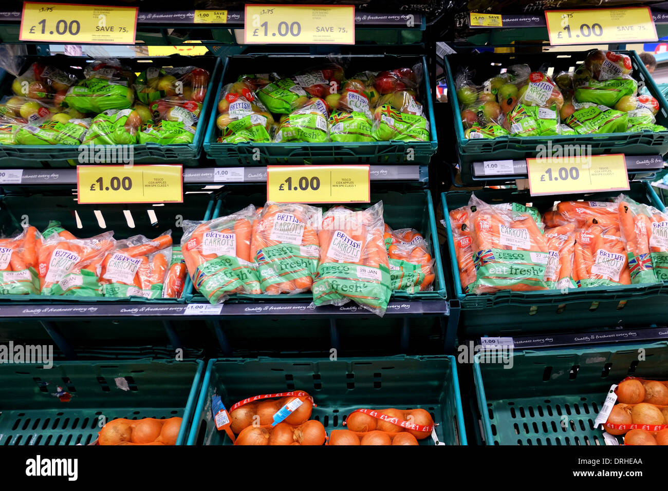 Fruit and vegetables for sale for £1 in a Tesco superstore Stock Photo