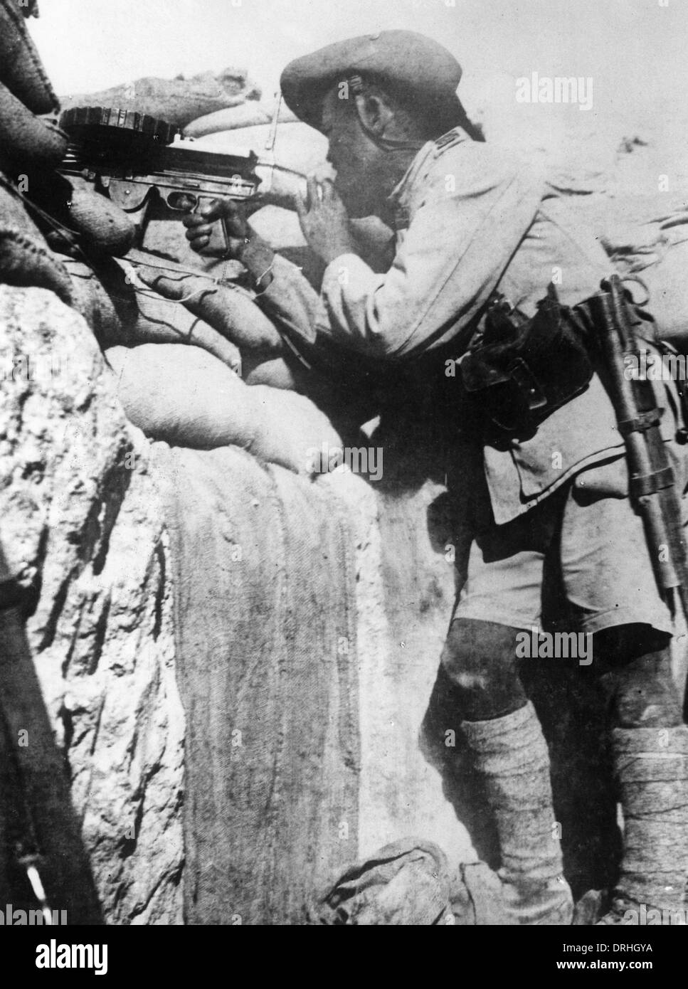 Gurkha firing Lewis gun in trenches, WW1 Stock Photo