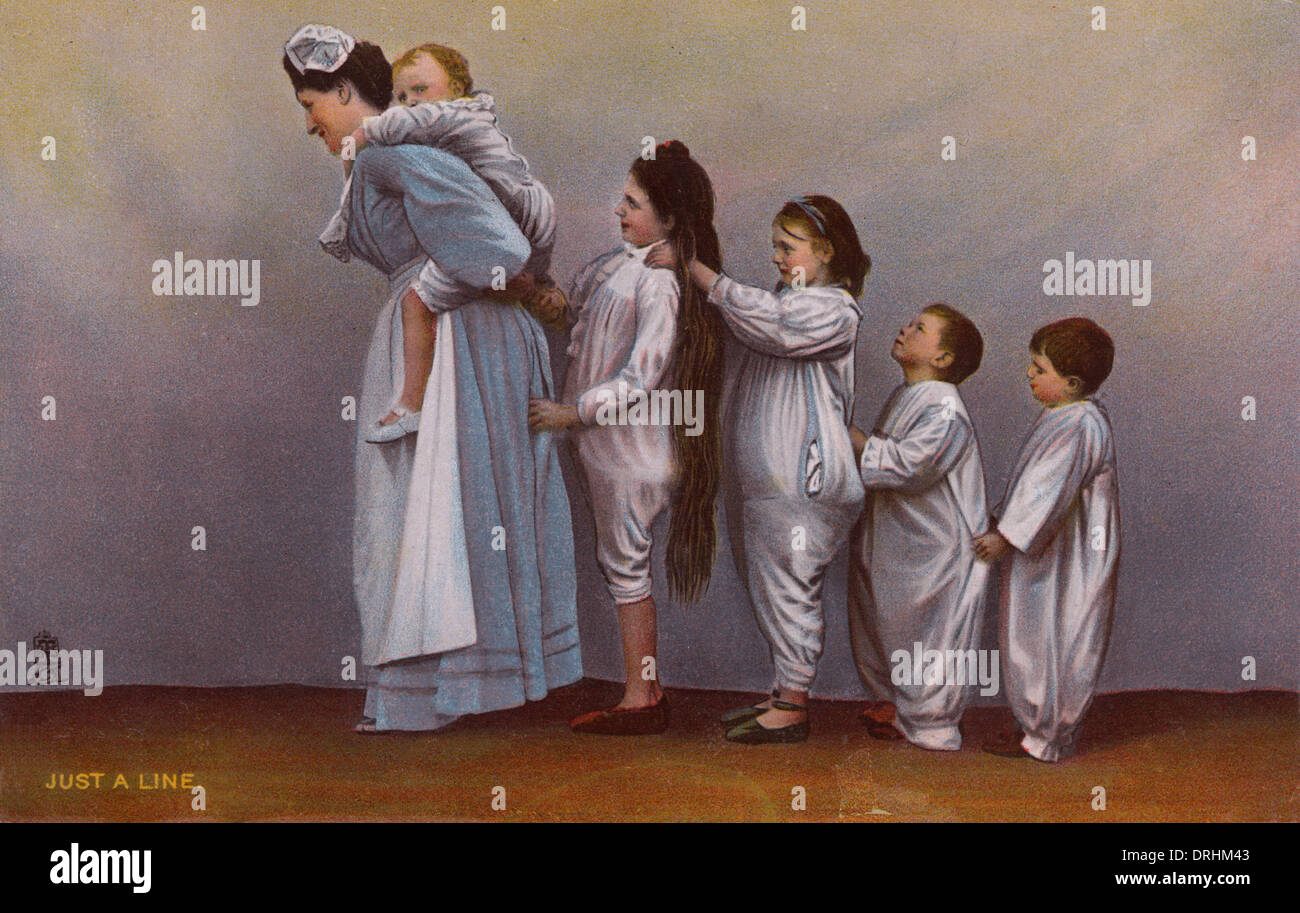 Nanny with five children all in a line Stock Photo