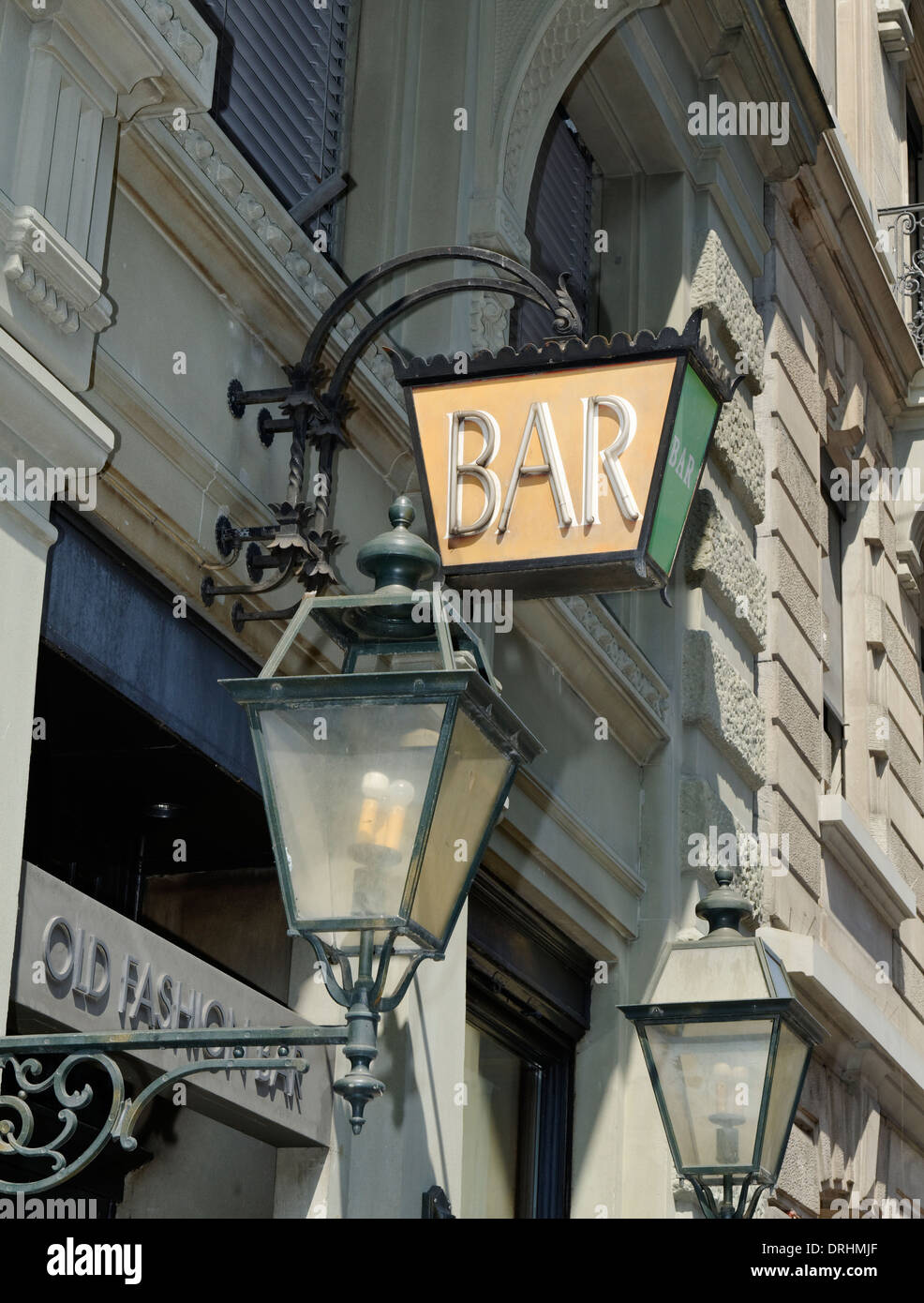 Old style BAR sign in Zurich with traditional European streetlights Stock Photo