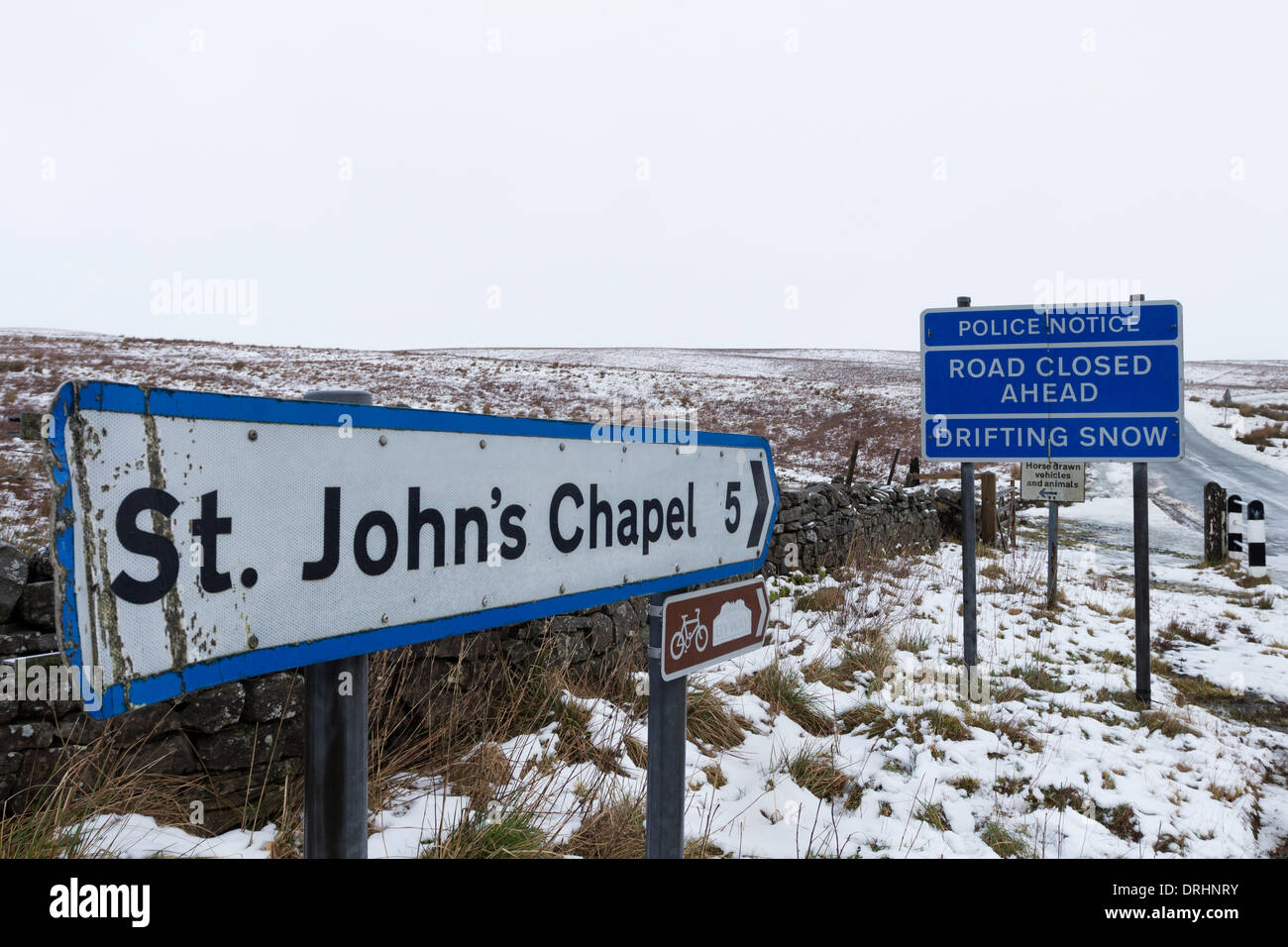 County Durham, UK. 27th January 2014. Road closed due to drifting snow and icy conditions at the junction of the B6277 at Langdon Beck in Teesdale and the Harthope road to St John's Chapel in Weardale County Durham UK. Credit:  David Forster/Alamy Live News Stock Photo
