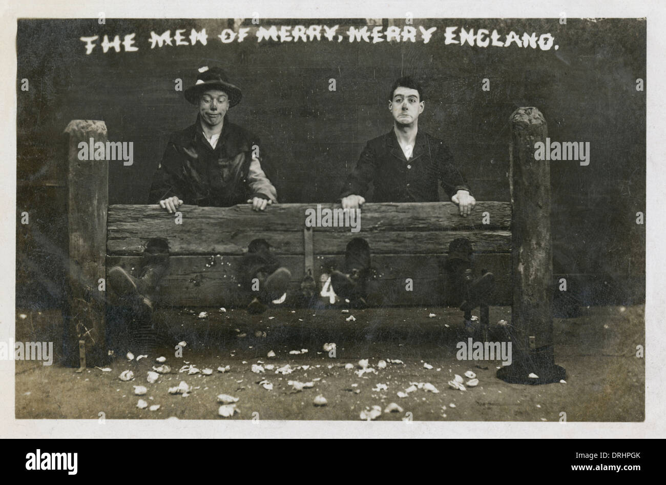 Men of Merry England - Two loons in the stocks Stock Photo