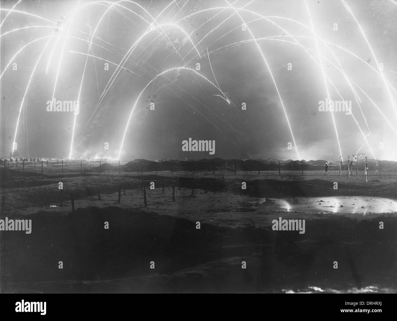 Flares in the night sky over a battlefield, WW1 Stock Photo