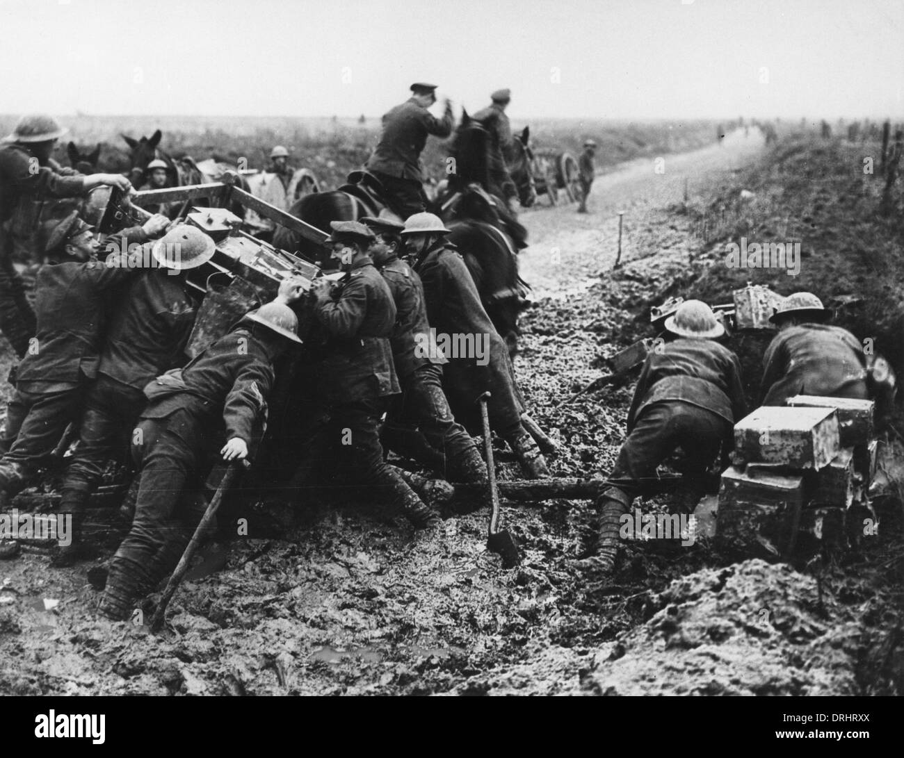 British troops extricating water cart from shell hole, WW1 Stock Photo