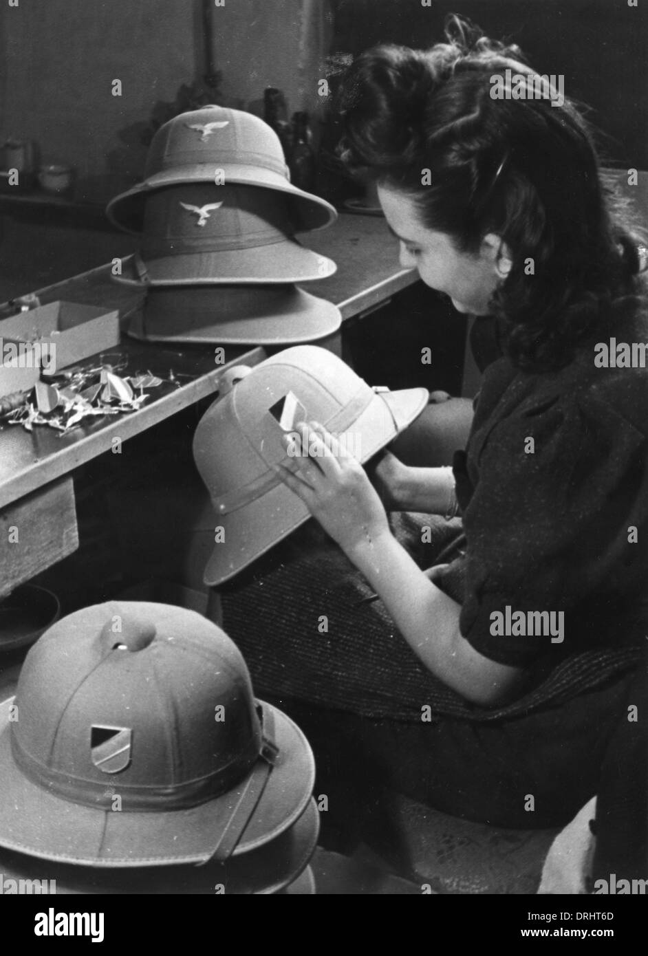 Making pith helmets for the German Afrika Korps - WWII Stock Photo - Alamy