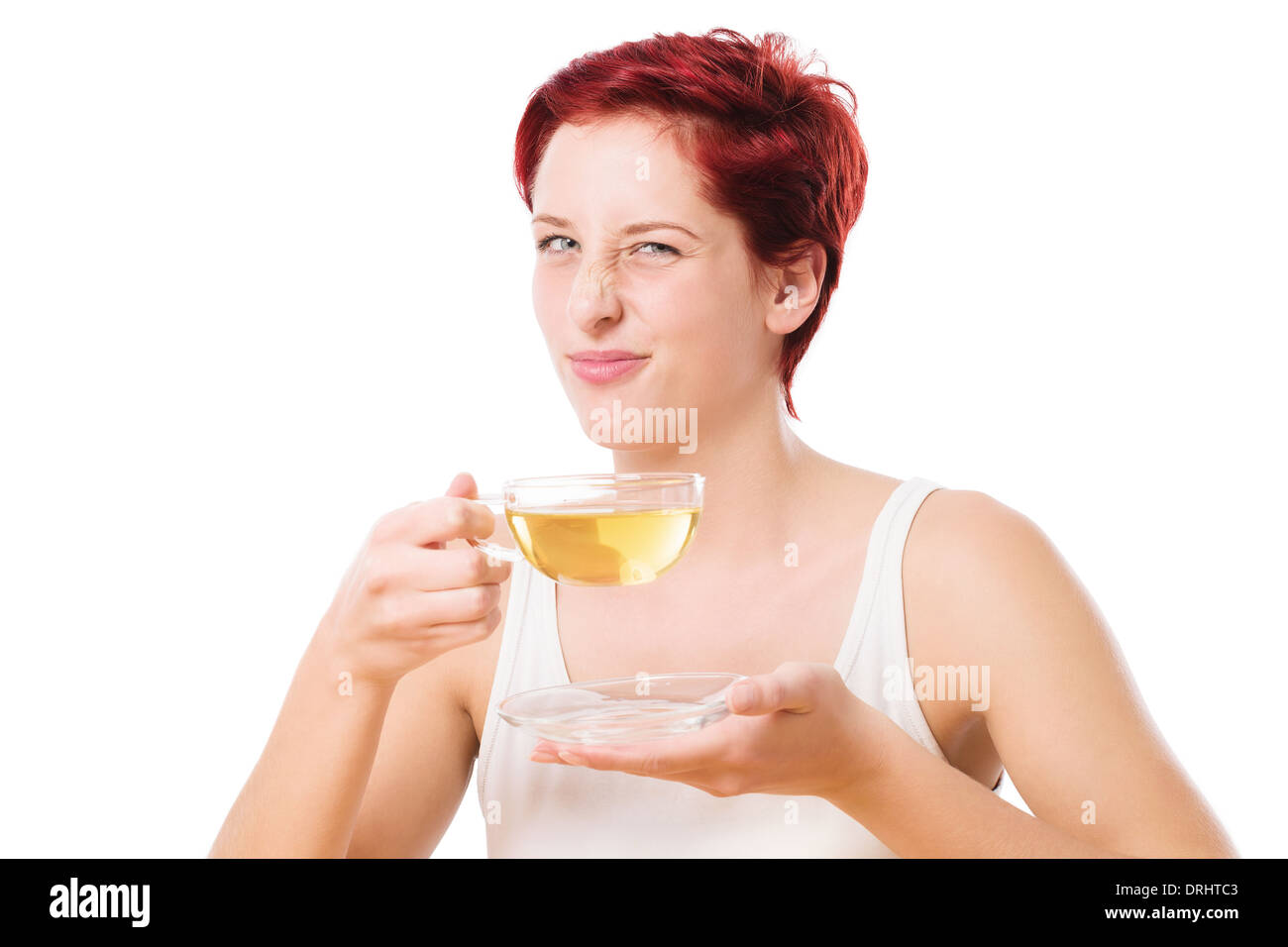woman disgusted from the tea on white background Stock Photo - Alamy