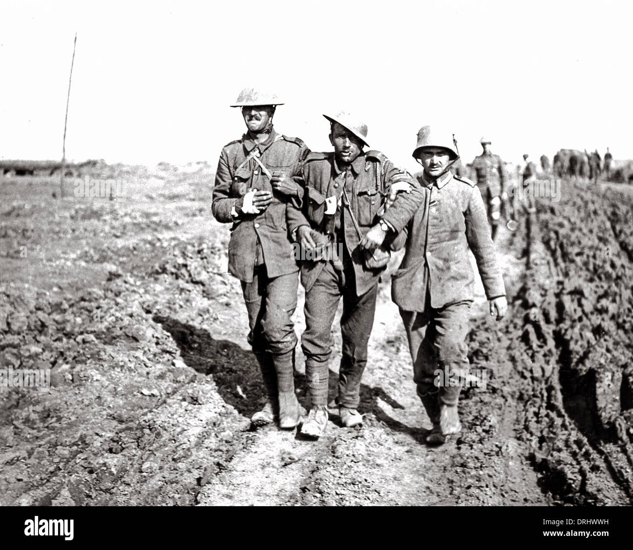 German NCO and two wounded guardsmen, WW1 Stock Photo