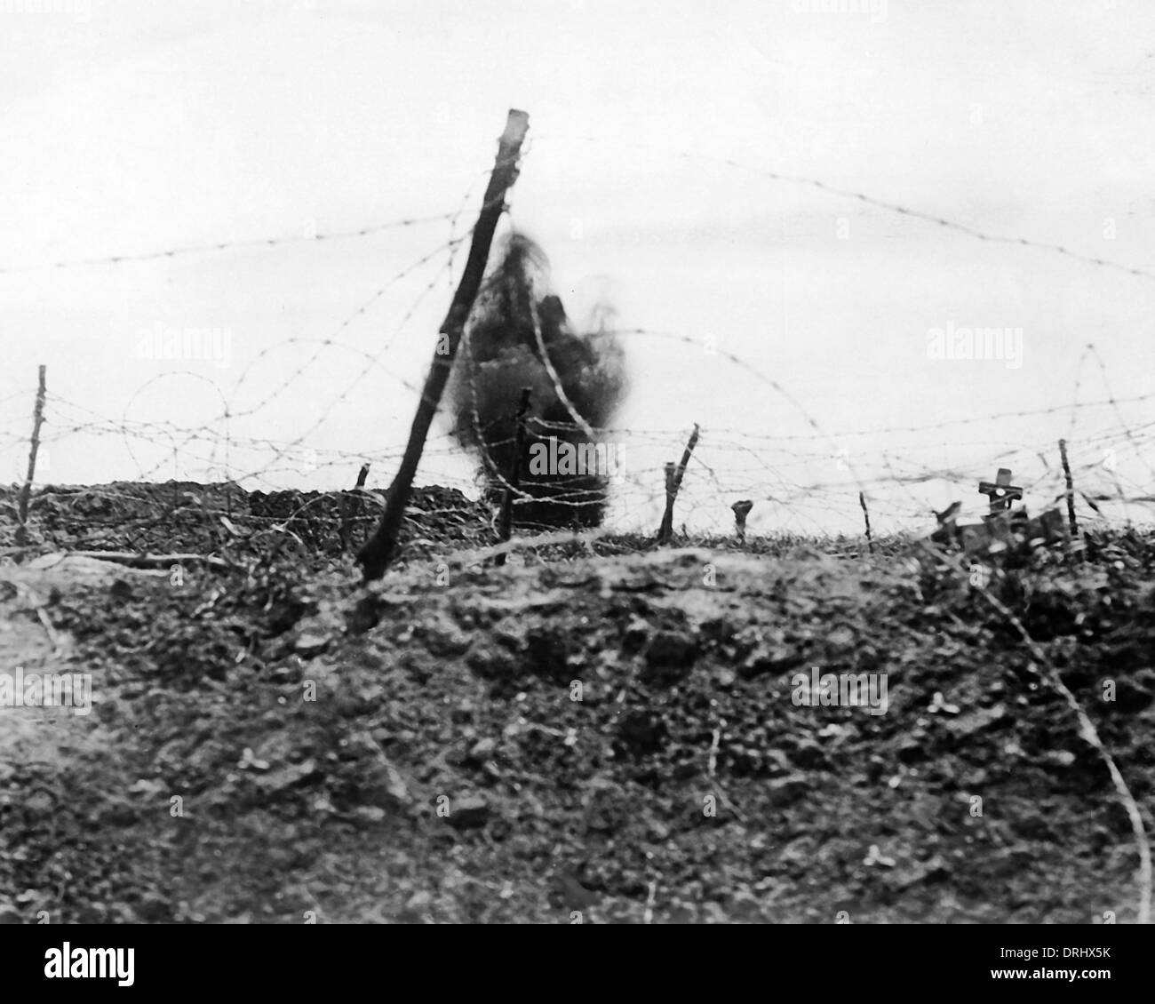 British shell bursting on German trenches, WW1 Stock Photo