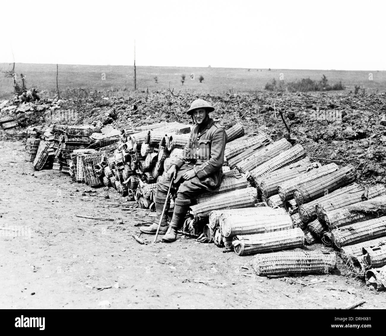 British soldier sitting at roadside, Western Front, WW1 Stock Photo
