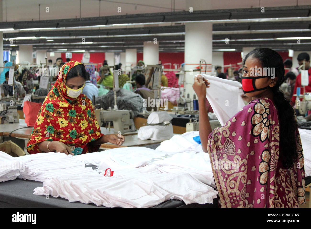 Women And Men Work In The Textile Factory One Composite Mills In Gazipur A Suburb Of Dhaka Bangladesh 03 January 2014 They Make Products For German Mail Order Company Klingel Sports Articles Producer
