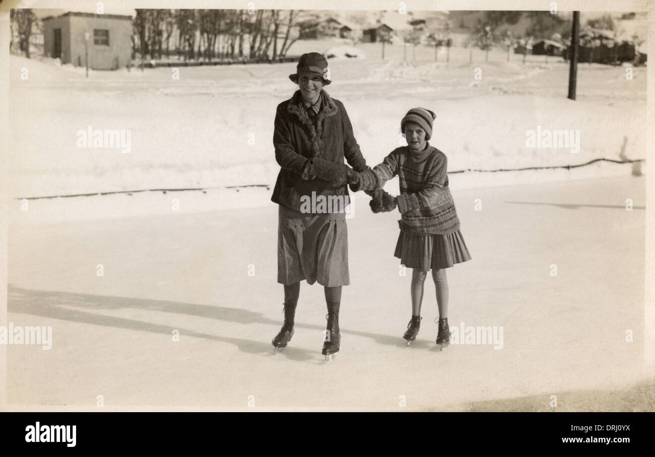 Two girls Ice Skating Klosters, Switzerland Stock Photo Alamy