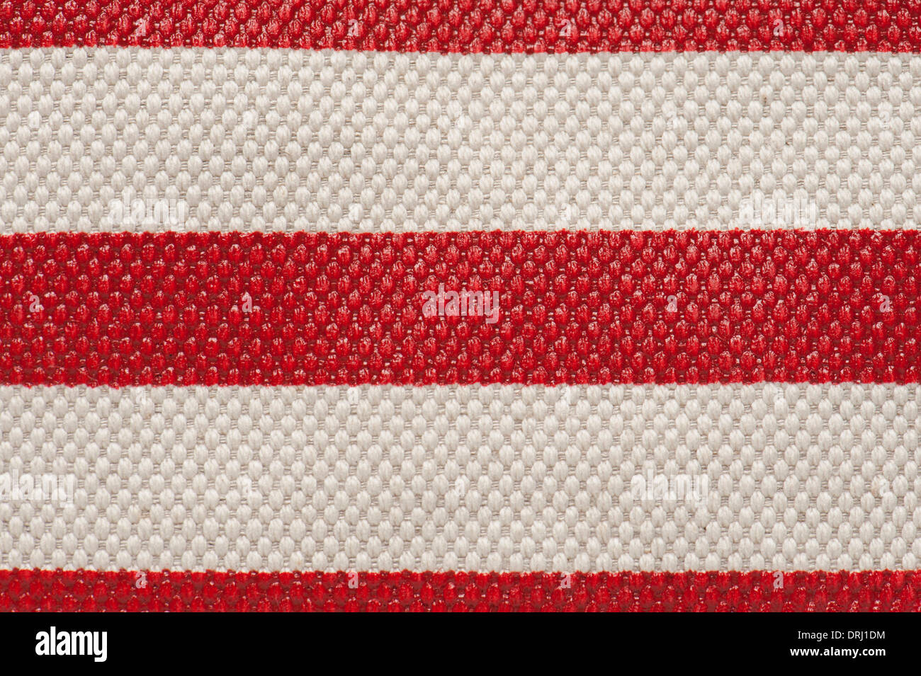 Macro of red and white plastic carpet Stock Photo