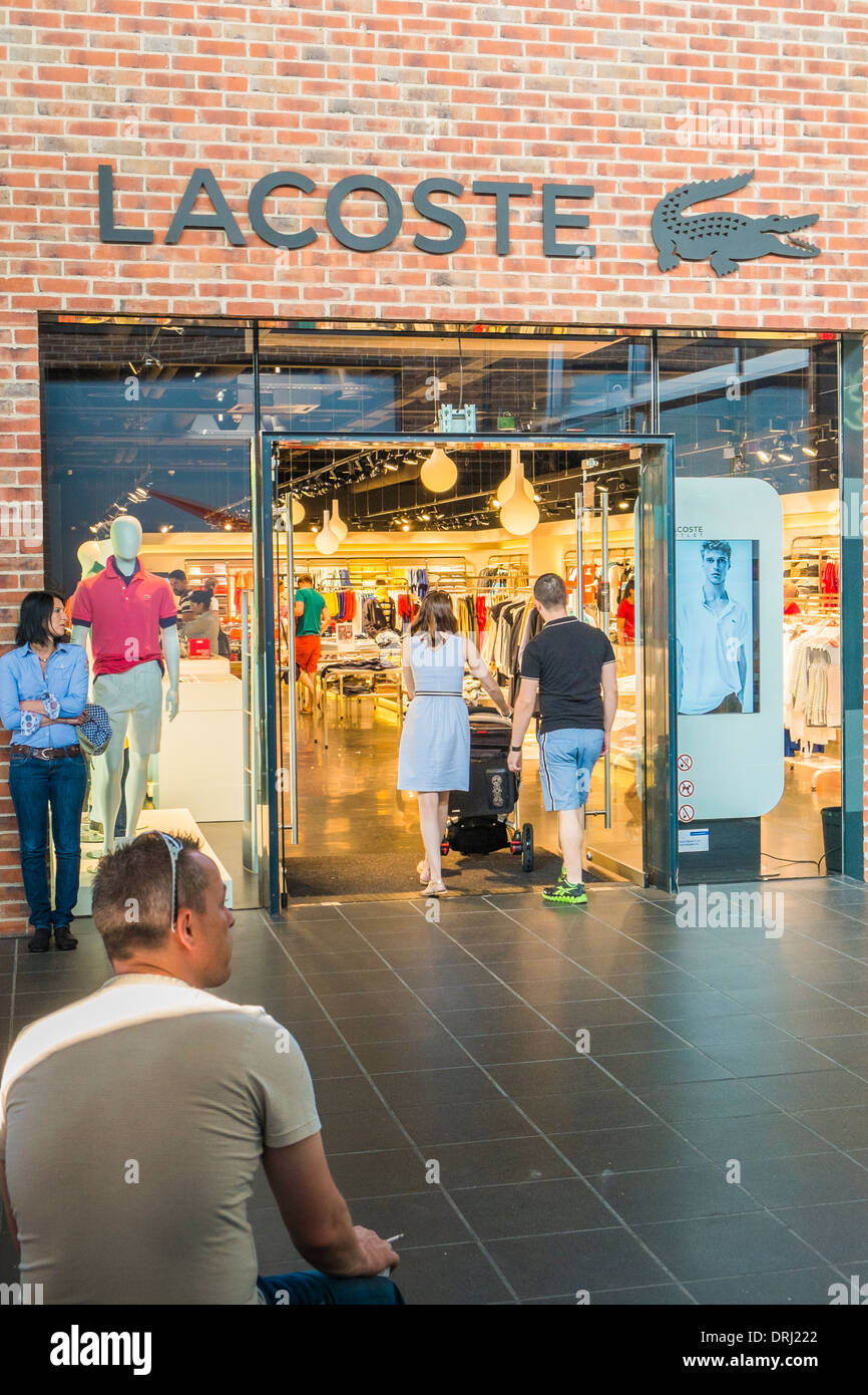 people shopping at lacoste outlet store, outlet city, metzingen,  baden-wuerttemberg, germany Stock Photo - Alamy