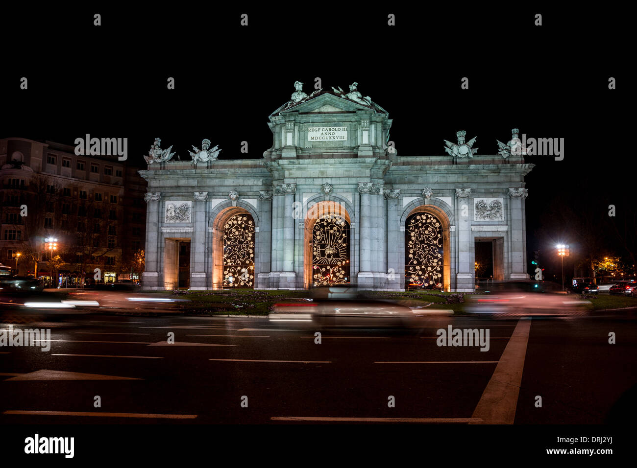 Night view of Puerta de Alcalá (Madrid) with Christmas decorations Stock Photo