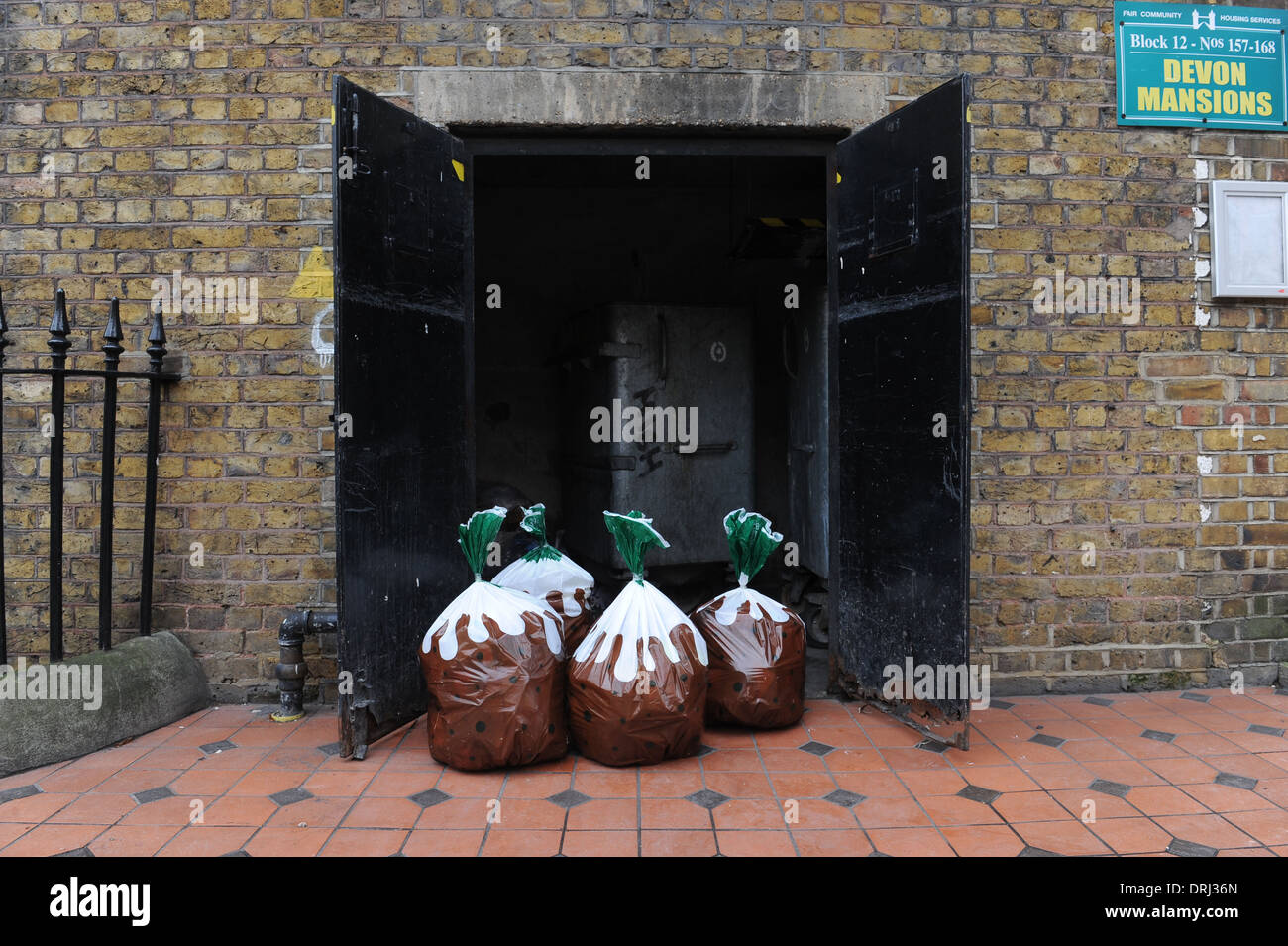 Xmas pudding rubbish bags out for collection Stock Photo Alamy