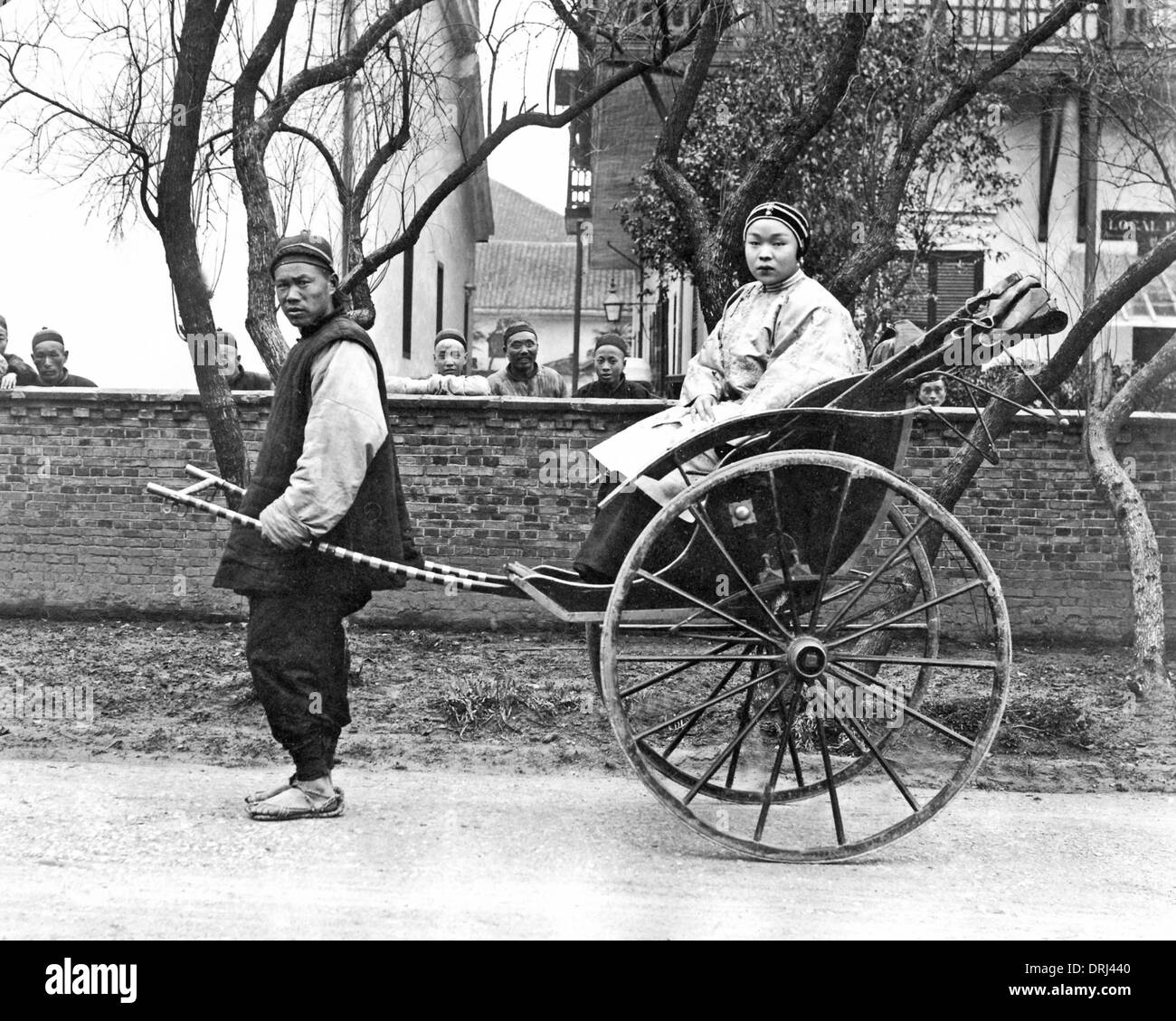 woman-in-rickshaw-china-DRJ440.jpg