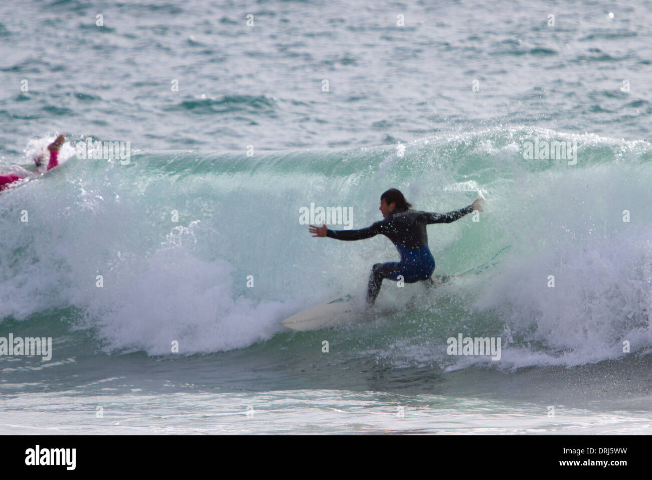 man Surfing sea wave  Mallorca Balearic islands Spain Stock Photo