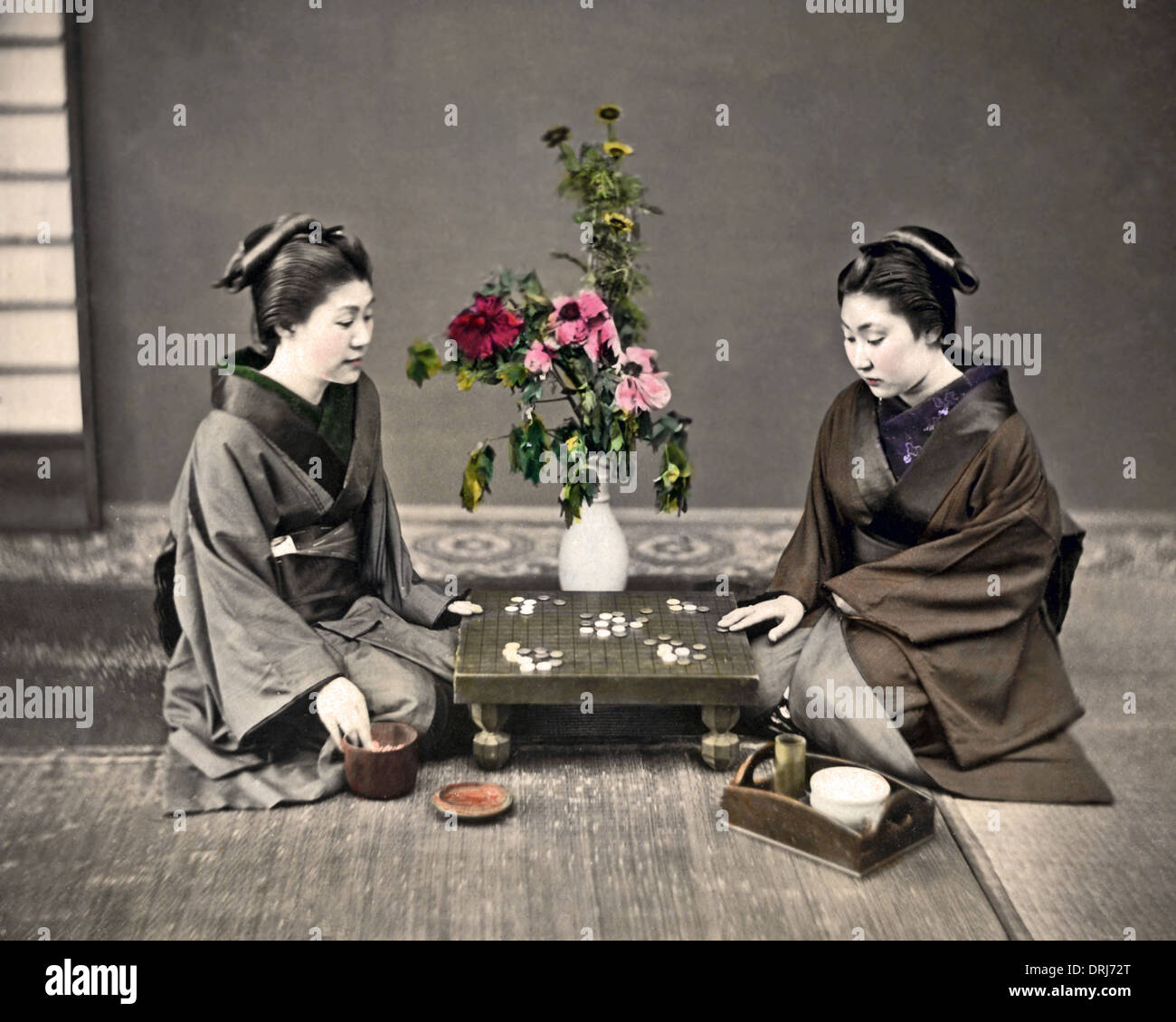 Two women playing board game, Japan Stock Photo