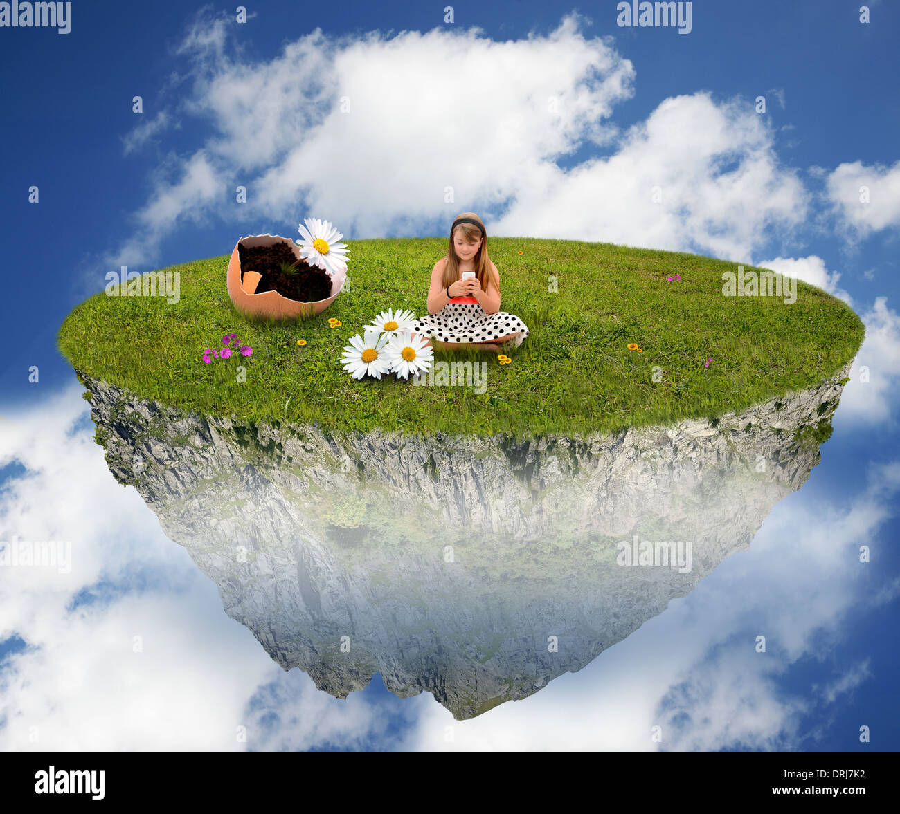 little blonde girl on meadow in the sky Stock Photo - Alamy