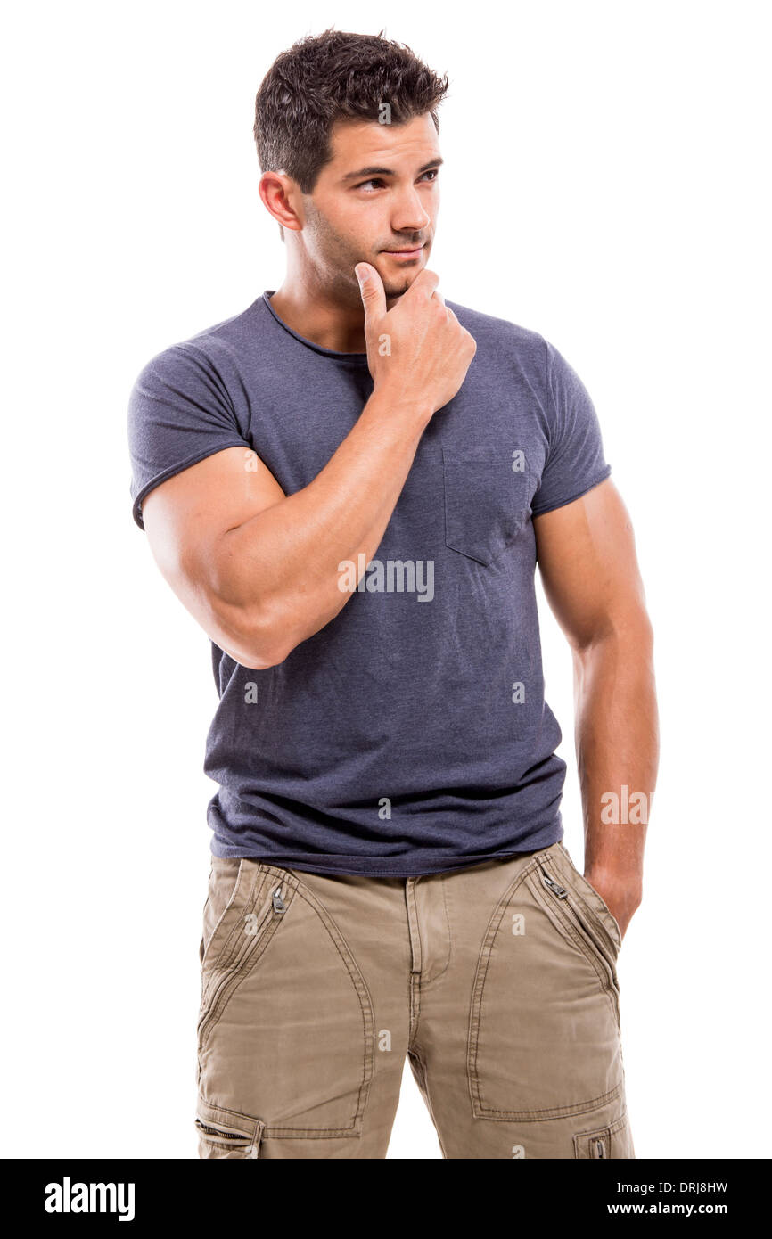 Handsome latin man with a thinking expression, isolated over a white background Stock Photo