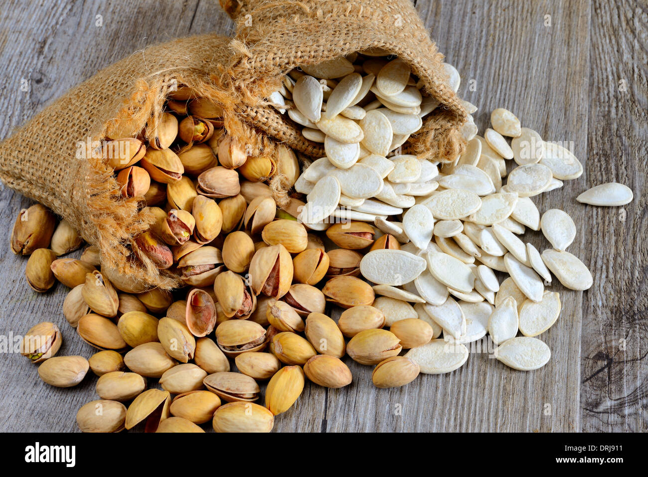 pistachios and pumpkin seeds nuts and grain Stock Photo