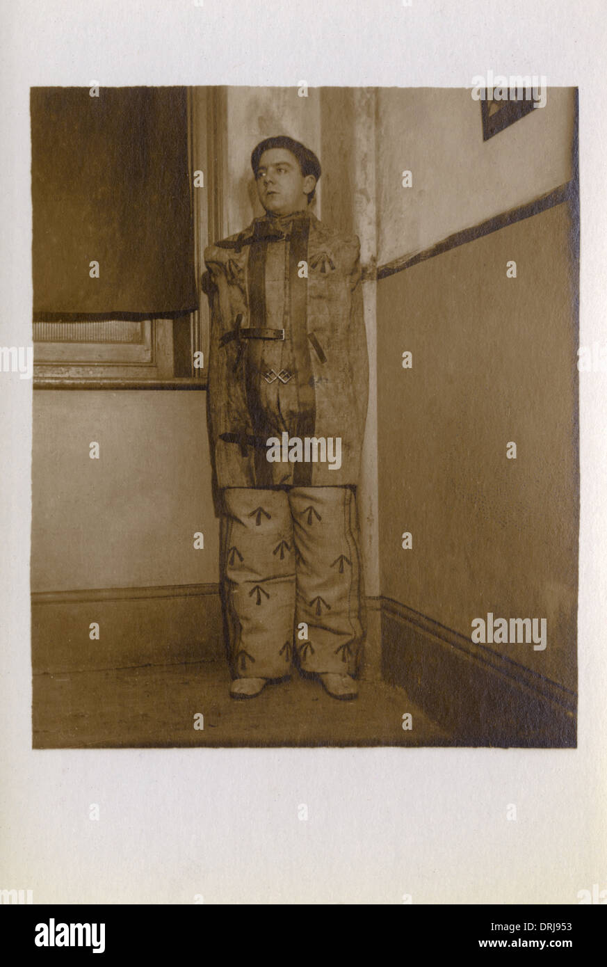 UK Prisoner in a Straitjacket Stock Photo