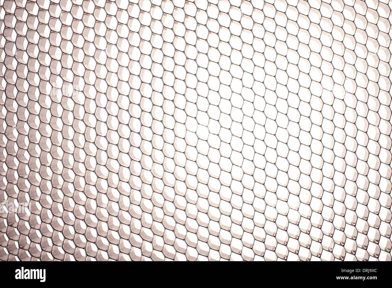 Honeycomb grid against white background Stock Photo