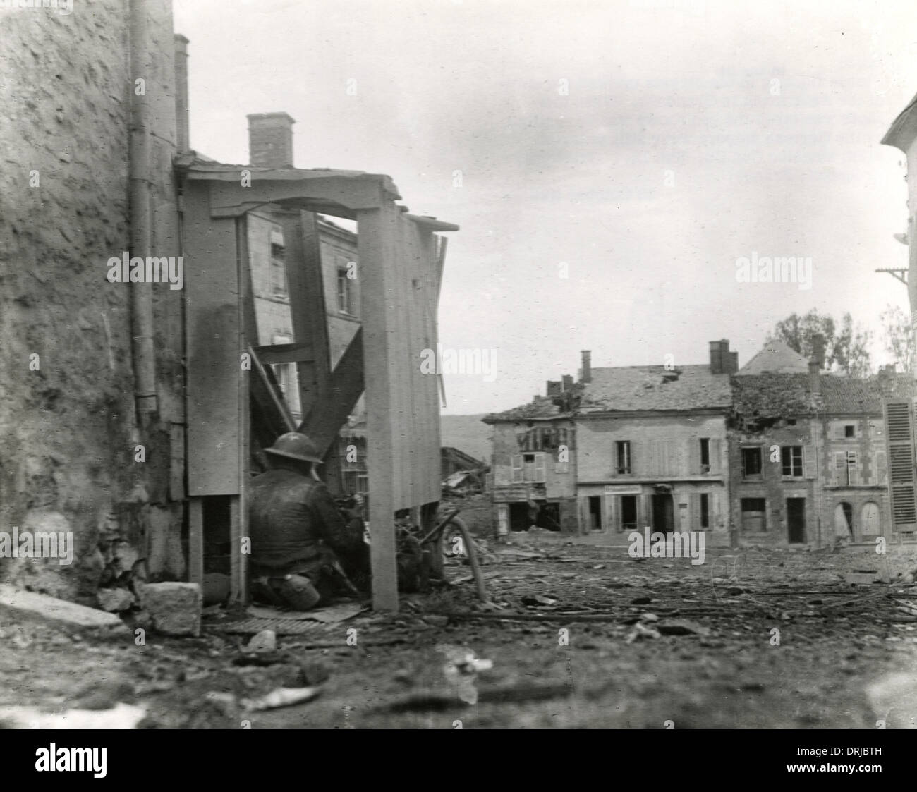 German machine gun in street, Grandpre, France, WW1 Stock Photo