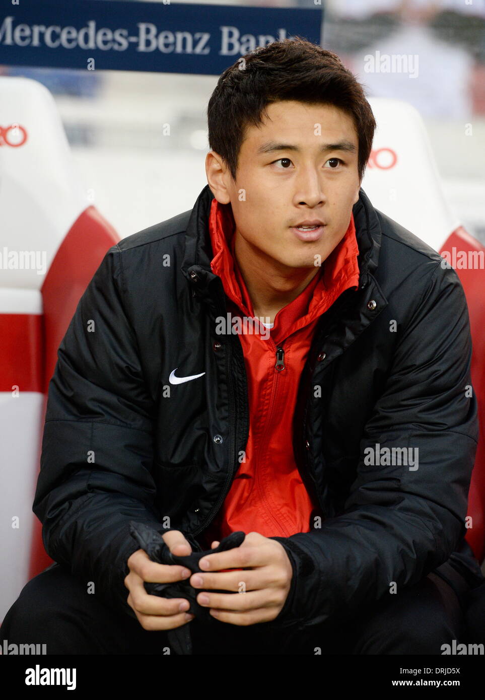 Stuttgart, Germany. 25th Jan, 2014. Mainz's new acquisition Ja-Cheol Koo sits on the substitutes' bench before the Bundesliga soccer match between VfB Stuttgart and 1. FSV Mainz 05 at Mercedes-Benz Arena in Stuttgart, Germany, 25 January 2014. Photo: BERND WEISSBROD/DPA/Alamy Live News Stock Photo