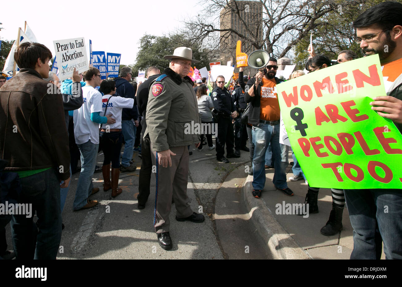 police attend a rally for life where both pro-choice and pro-life, anti-abortion groups attend at the Texas Capitol in Austin Stock Photo