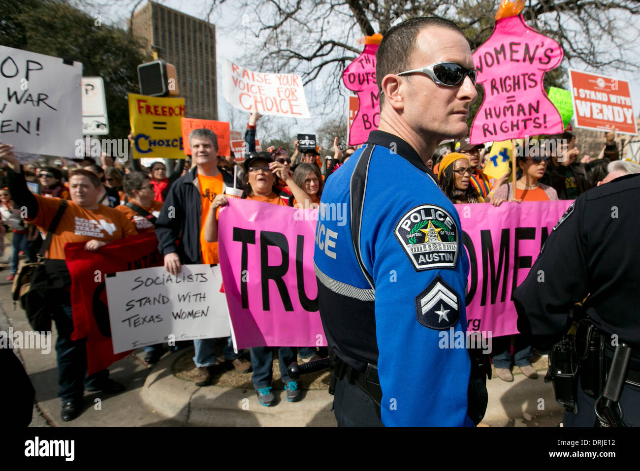 police attend a rally for life where both pro-choice and pro-life, anti-abortion groups attend at the Texas Capitol in Austin Stock Photo