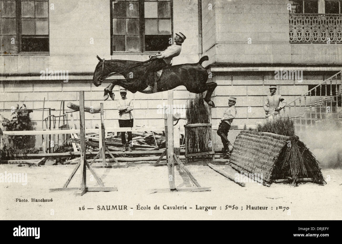 Cadre Noir - Saumur, France - Leaping a large obstacle Stock Photo - Alamy