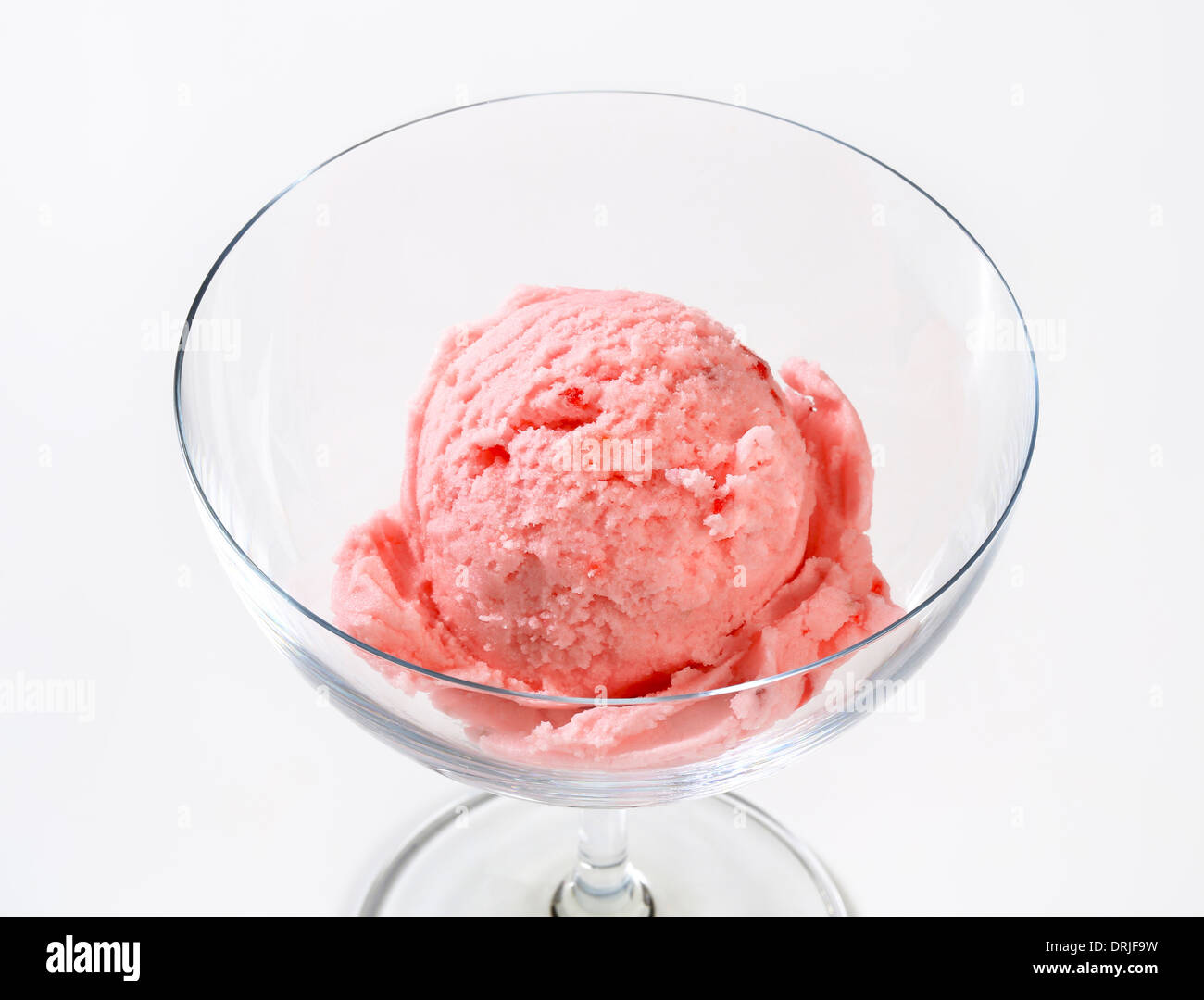 Scoop of strawberry ice cream in a coupe Stock Photo