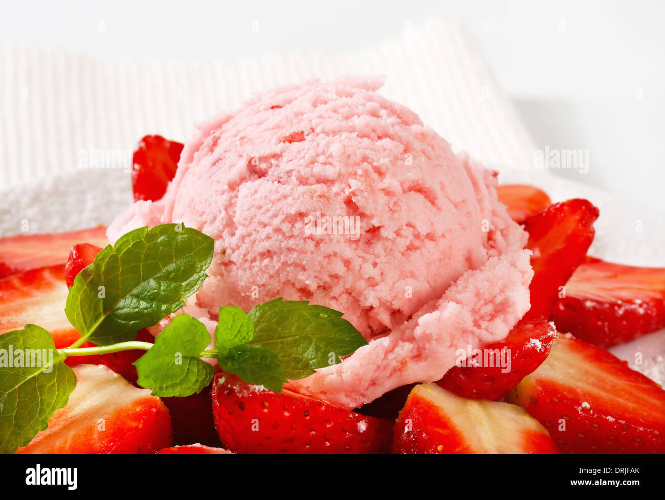 Scoop of strawberry sherbet with fresh fruit Stock Photo