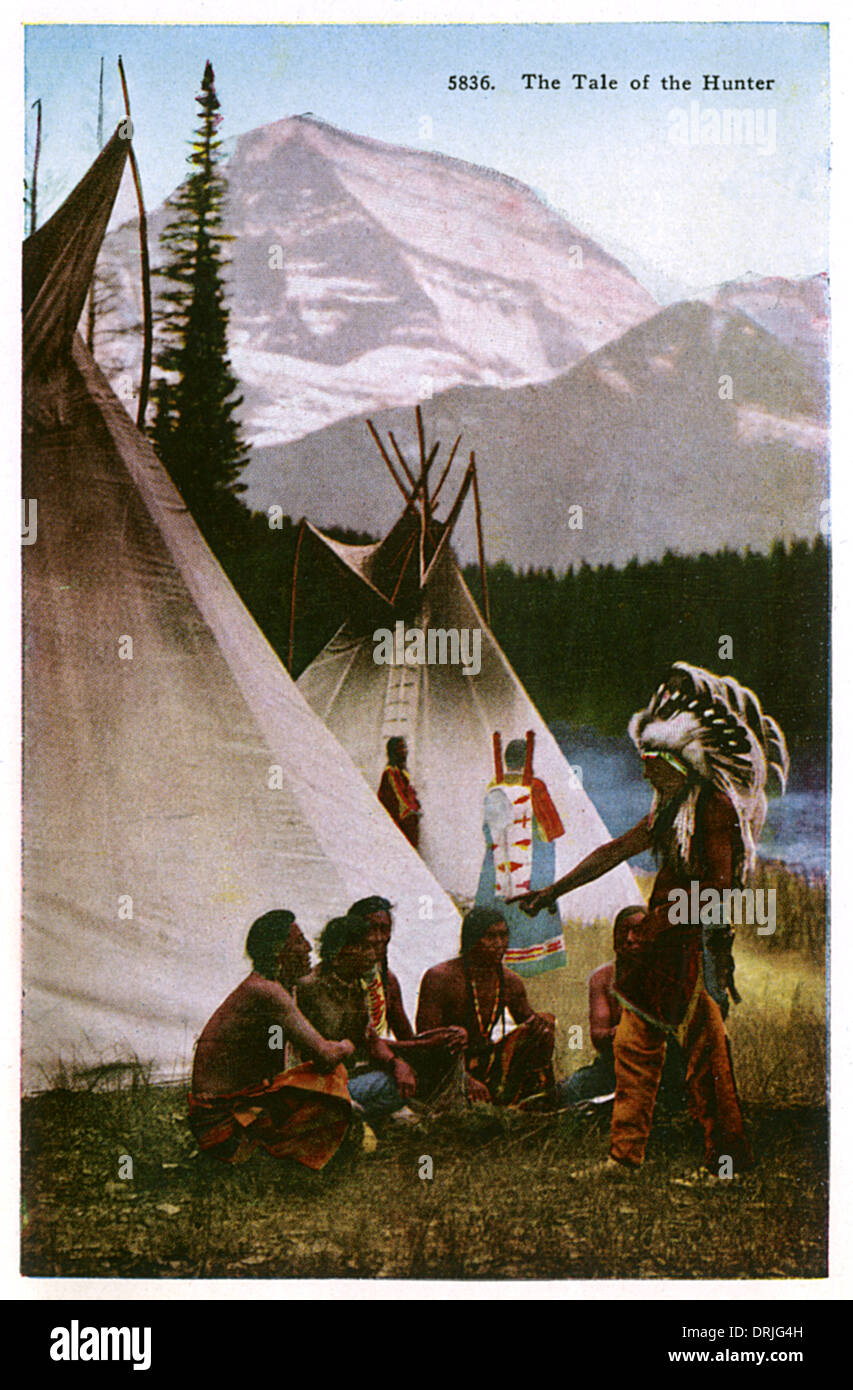 Native American Indians listening to hunter Stock Photo