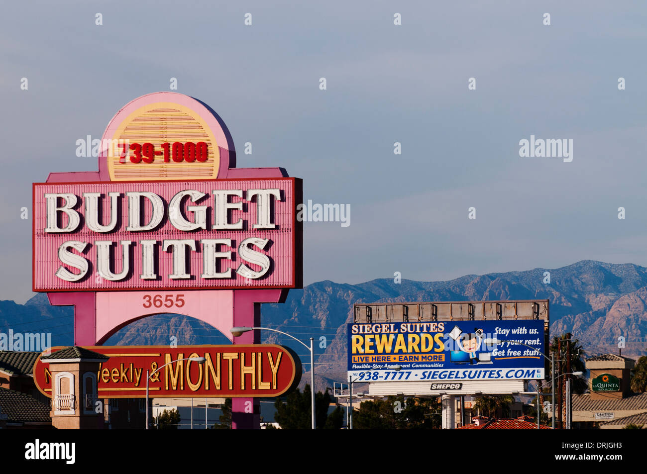 Budget accommodation in Las Vegas with mountains in background. Stock Photo