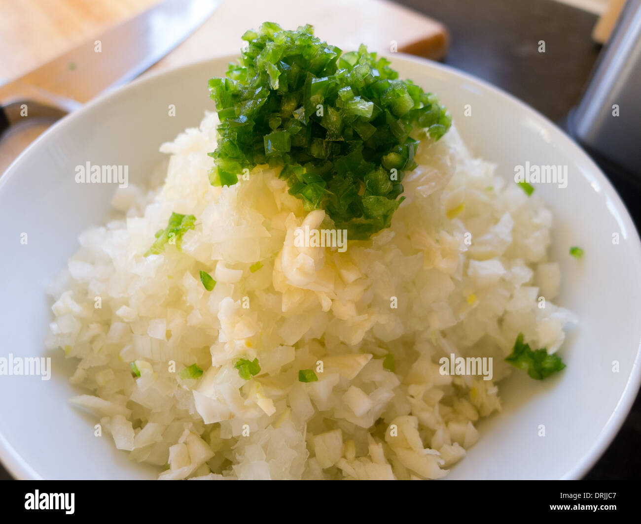 Finely chopped onion and chilli Stock Photo