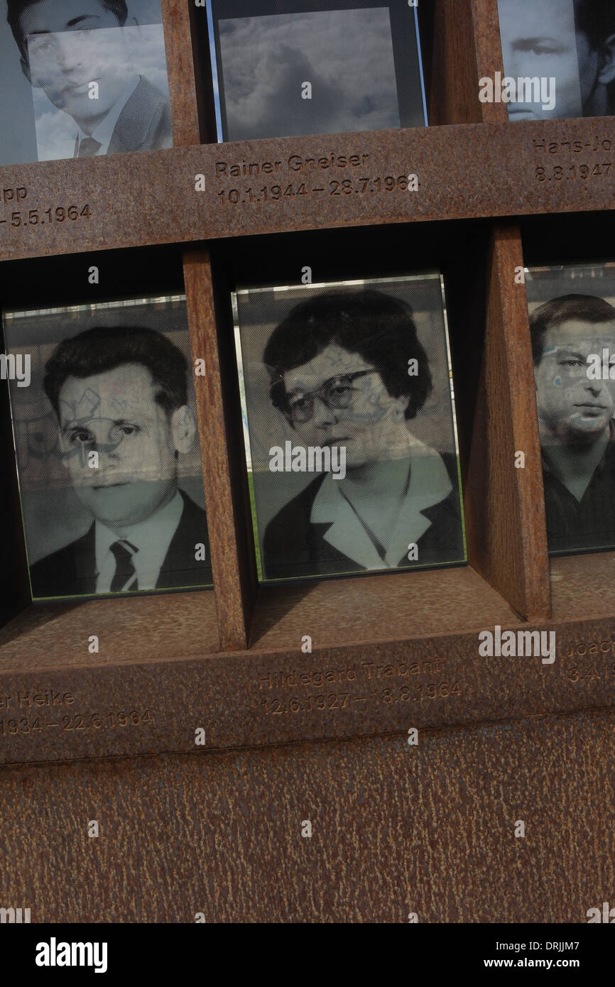 Sunny view two rows monochrome photographs 6 Berlin Wall victims