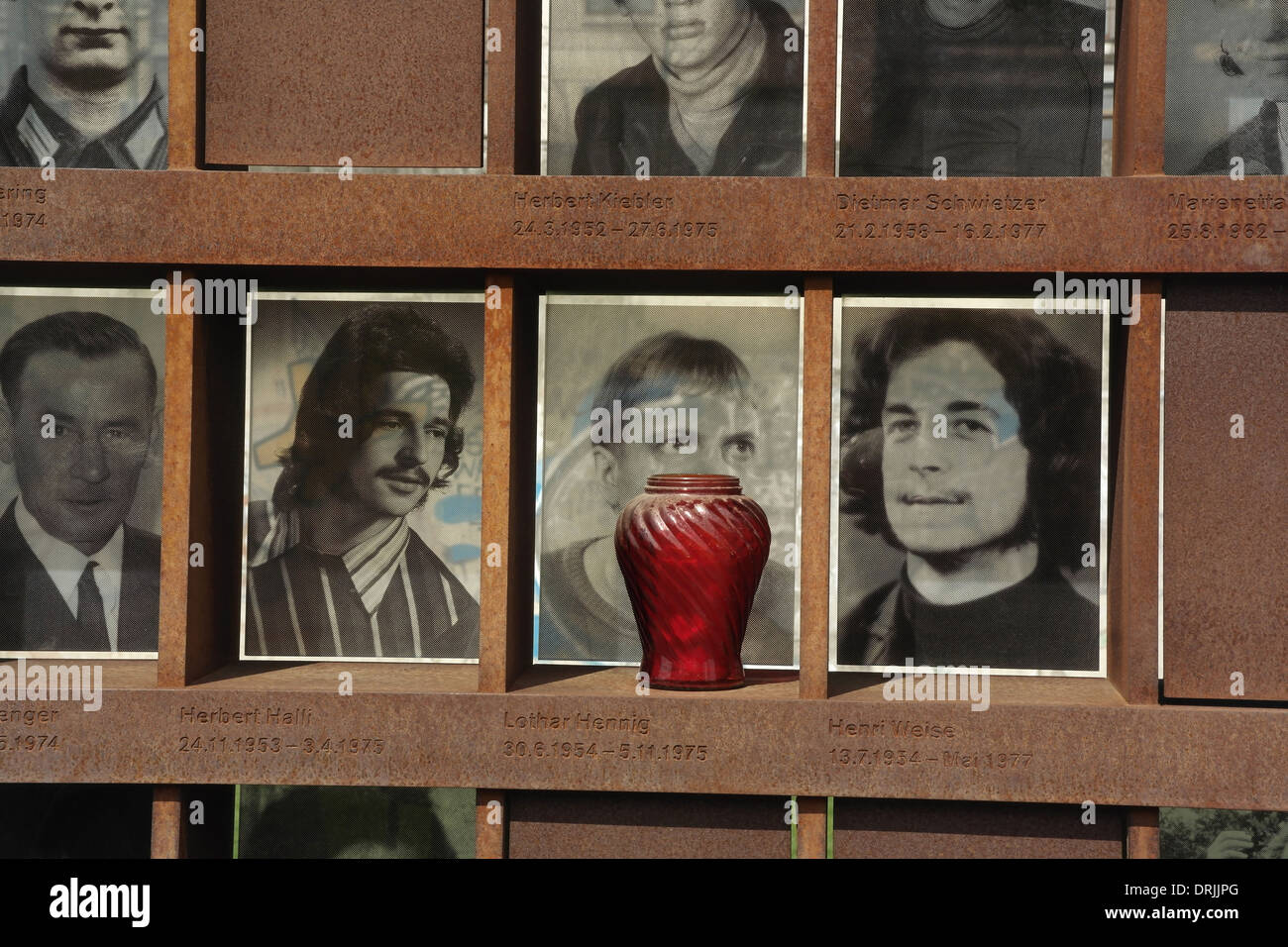 Sunny view two rows monochrome photographs 8 Berlin Wall victims