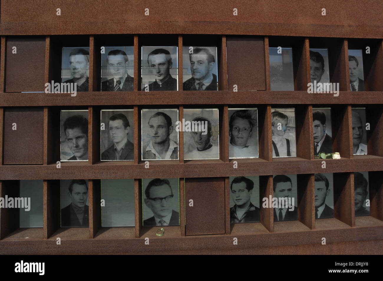Sunny view three rows monochrome photographs 23 Berlin Wall victims